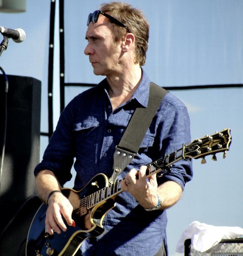 Doug Gillard performing live outdoors